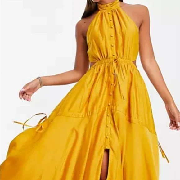 ASOS Design halter maxi dress with button up detail and tiered skirt in mustard-Yellow ASOS Design halter maxi dress with button up detail and tiered skirt in mustard-Yellow